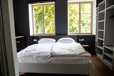 Ein Bett oder Betten in einem Zimmer der Unterkunft Hotel Restaurant Joseph