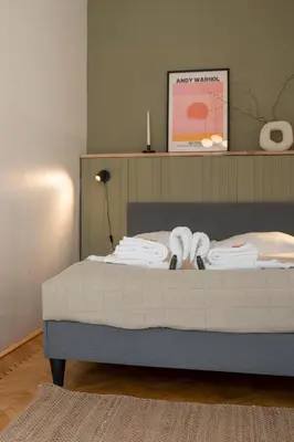 Ein Bett oder Betten in einem Zimmer der Unterkunft josef's home I Premium Apartment in Ideal Location