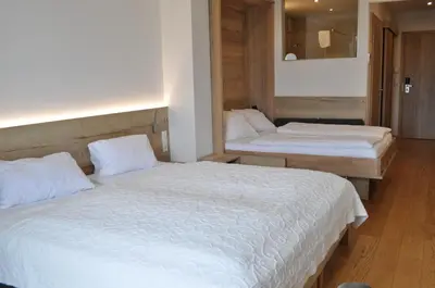 Ein Bett oder Betten in einem Zimmer der Unterkunft Seehotel Herlinde