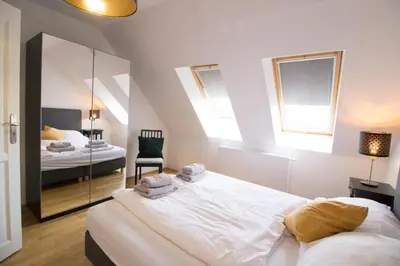 Ein Bett oder Betten in einem Zimmer der Unterkunft Wien Sky Loft l LF43