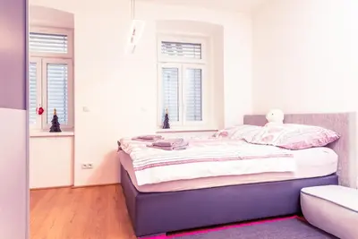Ein Bett oder Betten in einem Zimmer der Unterkunft Senator Flats Petrus & Kardinal Nagl