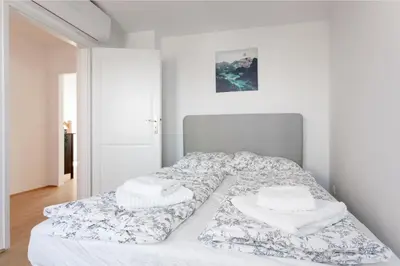 Ein Bett oder Betten in einem Zimmer der Unterkunft Skyline Aussicht l LF46