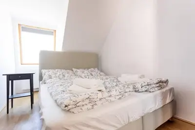 Ein Bett oder Betten in einem Zimmer der Unterkunft Skyline Penthouse l LF44