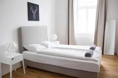 Ein Bett oder Betten in einem Zimmer der Unterkunft josef's home I Kaiserzeit Residence I 01