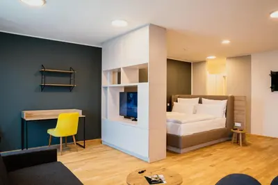 Ein Bett oder Betten in einem Zimmer der Unterkunft Rioca Vienna Posto 1