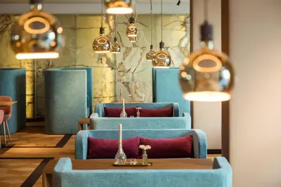 Ein Sitzbereich in der Unterkunft Austria Trend Hotel Maximilian