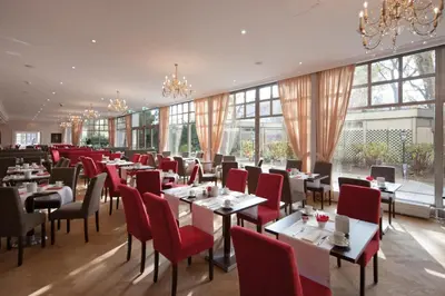 Ein Sitzbereich in der Unterkunft Austria Trend Hotel Maximilian