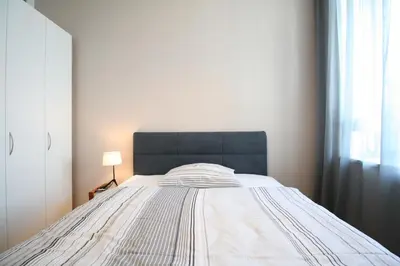 Ein Bett oder Betten in einem Zimmer der Unterkunft Your Living Vienna CBD