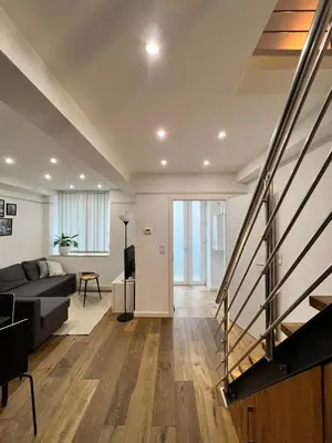 Ein Sitzbereich in der Unterkunft REMA Apartments 1090