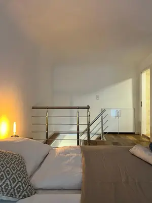 Ein Bett oder Betten in einem Zimmer der Unterkunft REMA Apartments 1090