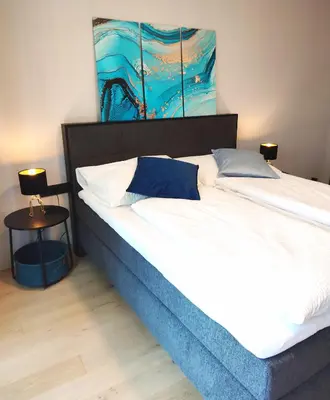 Ein Bett oder Betten in einem Zimmer der Unterkunft Design Apartment Vienna City Center - free parking!