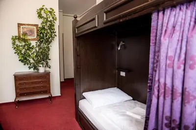 Ein Bett oder Betten in einem Zimmer der Unterkunft Vienna Boutique - Premium Hostel