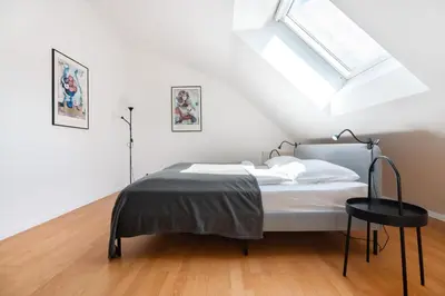 Ein Bett oder Betten in einem Zimmer der Unterkunft Vienna Roof Top Apartment with Terrace, Parking and AC