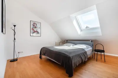 Ein Bett oder Betten in einem Zimmer der Unterkunft Vienna Roof Top Apartment with Terrace, Parking and AC