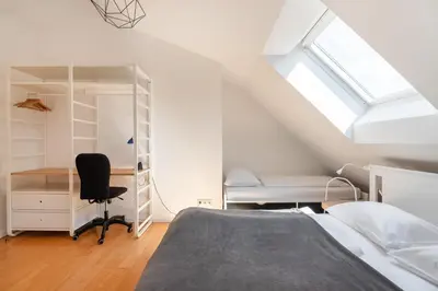 Ein Bett oder Betten in einem Zimmer der Unterkunft Vienna Roof Top Apartment with Terrace, Parking and AC