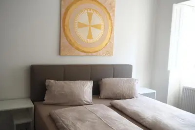 Ein Bett oder Betten in einem Zimmer der Unterkunft Weghuberhof Ferienwohnungen