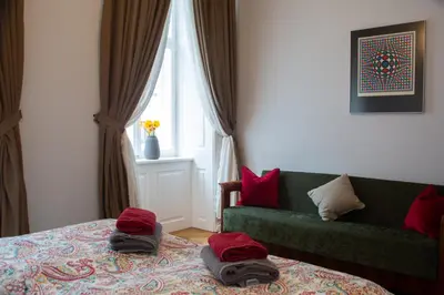 Ein Bett oder Betten in einem Zimmer der Unterkunft Stilvolles Apartment in zentraler Lage