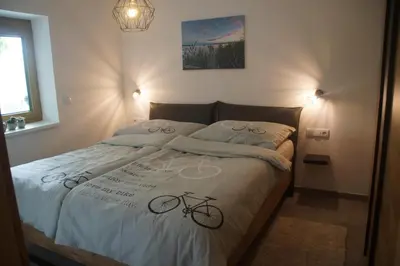 Ein Bett oder Betten in einem Zimmer der Unterkunft Kirschbluetenappartements