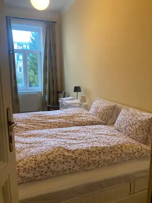 Ein Bett oder Betten in einem Zimmer der Unterkunft Charmantes Wiener Jugendstilhaus kostenloses WLAN