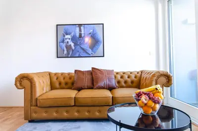 Ein Sitzbereich in der Unterkunft Grand Quarters City Residence