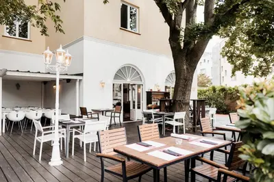 Ein Restaurant oder anderes Speiselokal in der Unterkunft Müllner Smart Hotel Wien Self Check In