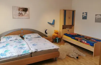 Ein Bett oder Betten in einem Zimmer der Unterkunft Ferienhaus Sonja