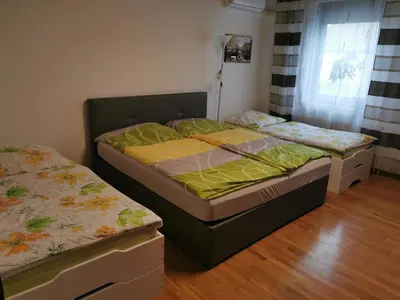 Ein Bett oder Betten in einem Zimmer der Unterkunft Ferienhaus Sonja