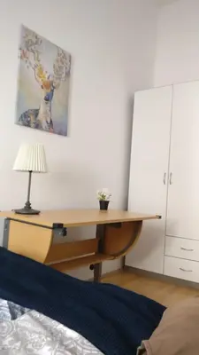 Ein Bett oder Betten in einem Zimmer der Unterkunft RoooMS by JR City Apartments