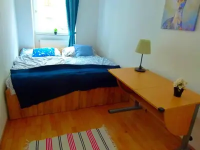 Ein Bett oder Betten in einem Zimmer der Unterkunft RoooMS by JR City Apartments