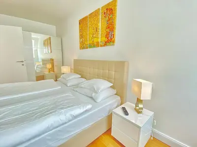 Ein Bett oder Betten in einem Zimmer der Unterkunft Steiner Residences Vienna Nestroyplatz