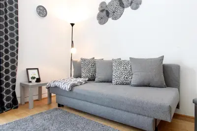 Ein Sitzbereich in der Unterkunft Modern Balcony Apartment with Pool close to Lake in 