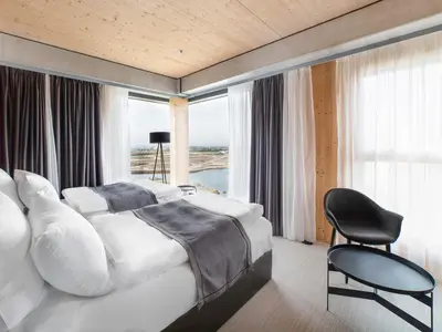 Ein Bett oder Betten in einem Zimmer der Unterkunft DORMERO HoHo Wien