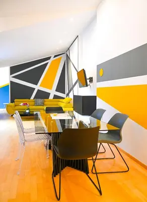 Ein Sitzbereich in der Unterkunft Modern Suite City Center