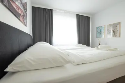 Ein Bett oder Betten in einem Zimmer der Unterkunft Charming Apartment with Balcony, Close to Stephansdom Cathedral