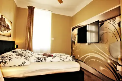 Ein Bett oder Betten in einem Zimmer der Unterkunft Boutique Apartments Vienna - Design 5