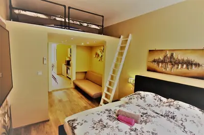 Ein Bett oder Betten in einem Zimmer der Unterkunft Boutique Apartments Vienna - Design 5