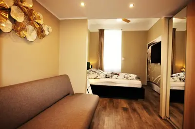 Ein Bett oder Betten in einem Zimmer der Unterkunft Boutique Apartments Vienna - Design 5