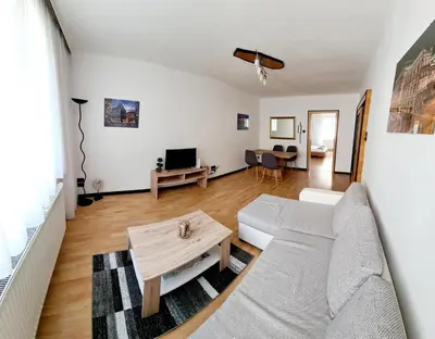 Ein Sitzbereich in der Unterkunft Sunny Apartment