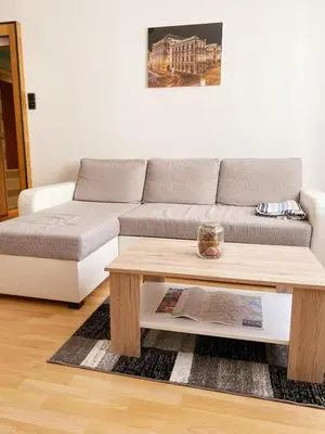 Ein Sitzbereich in der Unterkunft Sunny Apartment