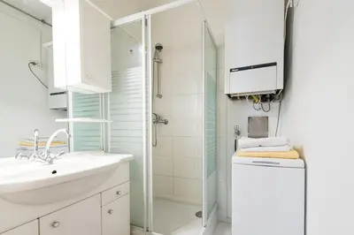 Ein Badezimmer in der Unterkunft Sunny Apartment