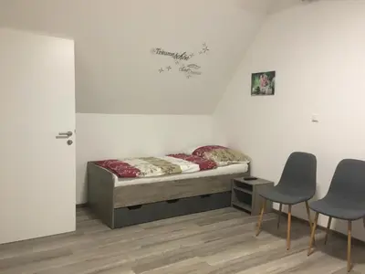 Ein Bett oder Betten in einem Zimmer der Unterkunft Pension Seeblick Latzko