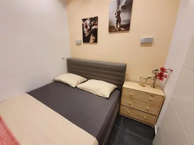 Ein Bett oder Betten in einem Zimmer der Unterkunft Design-Apartment mit Klimaanlage & Top-Anbindung an der U1