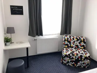 Ein Sitzbereich in der Unterkunft Pension Tennisweber