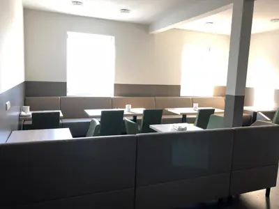 Ein Sitzbereich in der Unterkunft Pension Tennisweber