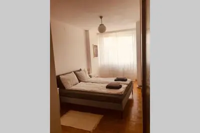 Ein Bett oder Betten in einem Zimmer der Unterkunft Mitten im Achten. Zentrale Wohnung in Wien