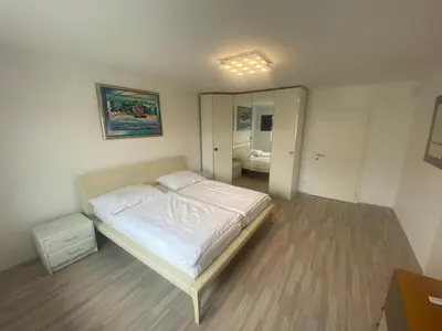 Ein Bett oder Betten in einem Zimmer der Unterkunft Einfamillienhaus