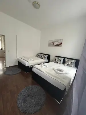 Ein Bett oder Betten in einem Zimmer der Unterkunft Rover Apartment
