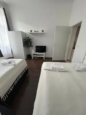 Ein Bett oder Betten in einem Zimmer der Unterkunft Rover Apartment