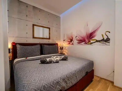 Ein Bett oder Betten in einem Zimmer der Unterkunft Bright Apartment Mariahilf