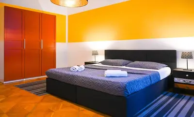 Ein Bett oder Betten in einem Zimmer der Unterkunft Backpacker Apartment City Center